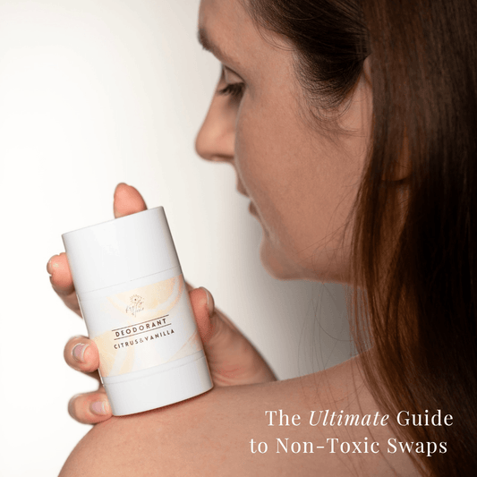 Woman holding natural deodorant on shoulder – eco-friendly, non-toxic skincare product